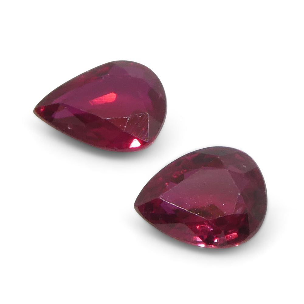 1.47ct Pear Purplish Red Ruby Pair from Thailand, premium matched gemstones by SkyJems Canadian gem specialists