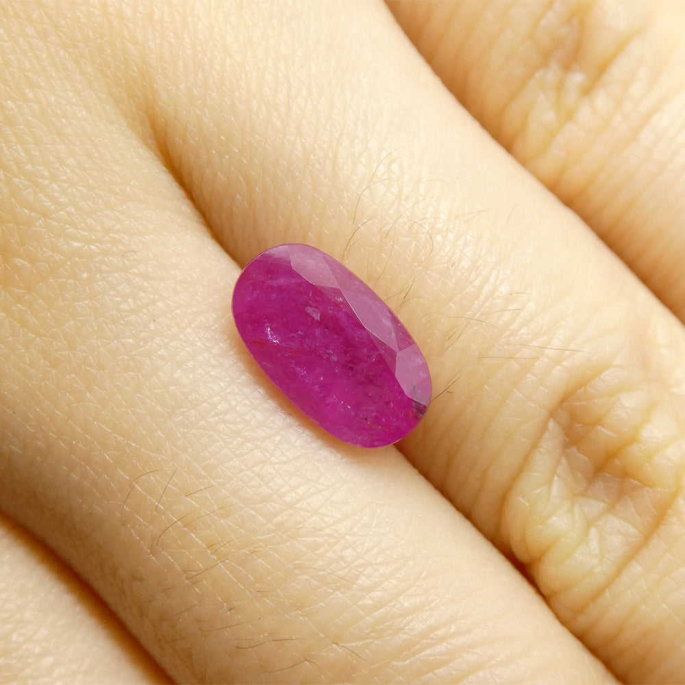 2.7 carat oval purplish red Vietnamese ruby, unheated natural gemstone from SkyJems premium colored gem collection