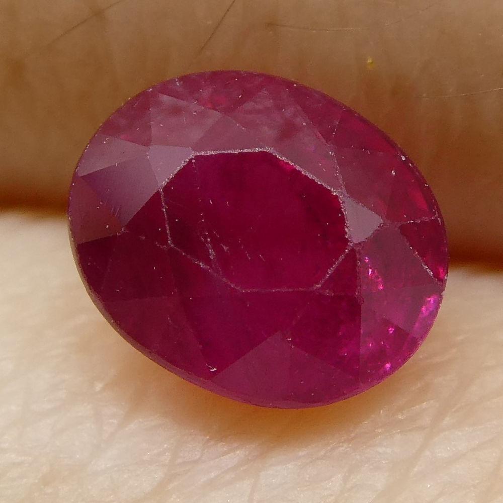 0.83 ct Oval Burma Ruby in vibrant red, precision-cut Modified Brilliant style by SkyJems Canadian gemstone experts