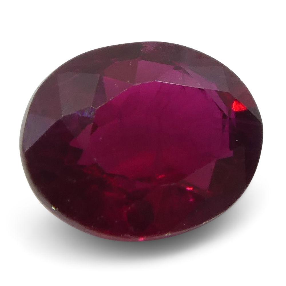 0.67 ct Oval Burma Ruby in vibrant red, precision-cut Modified Brilliant style by SkyJems Canadian gemstone experts