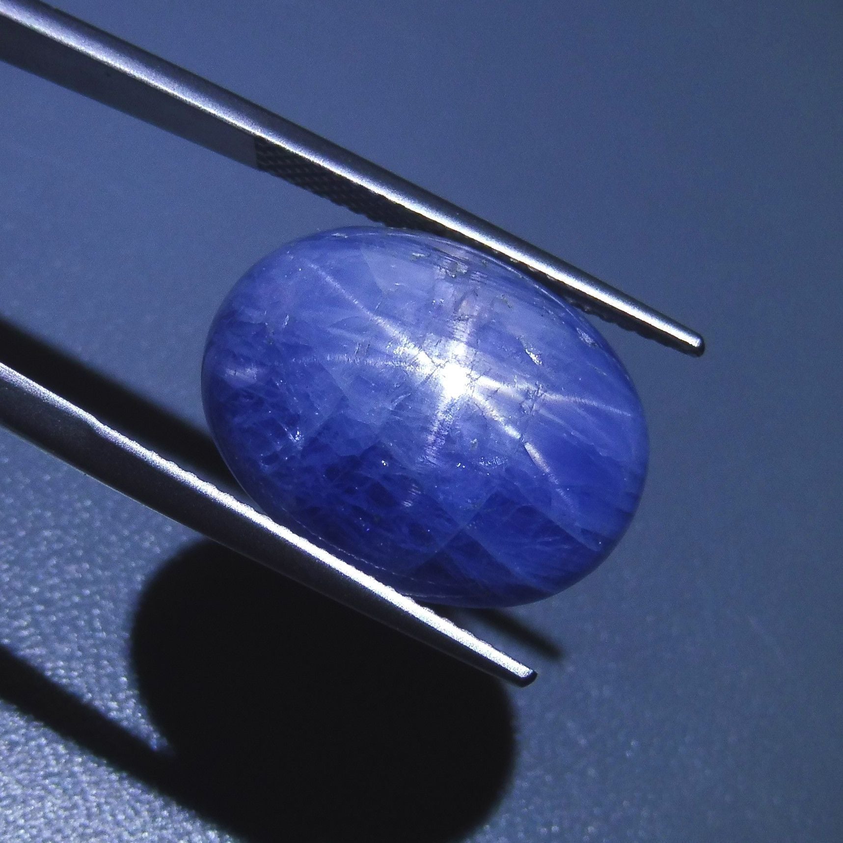 25 carat blue star sapphire from Myanmar, oval cabochon with asterism effect, premium gemstone by SkyJems Canadian gem specia